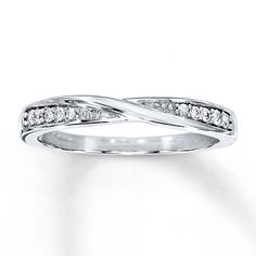 a white gold wedding band with diamonds