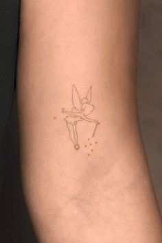 28 Hottest Tinker Bell Tattoo Ideas and Designs #tattoo #art #outline #template #portfolio #idea #neck #minimalist #inspiration Evangeline Princess And The Frog Tattoo, Tinker Bell Tattoo Design, Disney Tattoos Fine Line, Minimalistic Disney Tattoo, Disney Tattoos Minimalist, Disney Outline Tattoo, Princess Tiana Tattoo Ideas, Fine Line Disney Tattoo