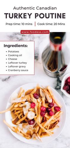 a white plate topped with french fries and cranberries