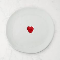 Soft organic shapes and bright red hearts give our creamy white plates the homespun charm of handmade paper Valentines. The sturdy stoneware pieces provide endearing presentation for festive meals from brunch and afternoon tea to a romantic dinner. Made of glazed stoneware. Microwavable and dishwasher safe. Coordinates with the rest of our Valentine's Day collection. Sold as a set of four online, or individually in our stores. Minimal Valentines Decor, Festive Meals, Paper Valentines, Heart Party, White Plates, Romantic Dinner, Party Tableware, Plates Set, Romantic Dinners