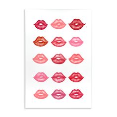 various lipstick shapes on a white paper with red and pink lips in the shape of kisses