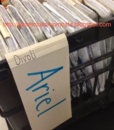 a bin full of files with a sign that says divolt area on it