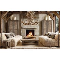 a living room with two couches and a fire place in the middle of it