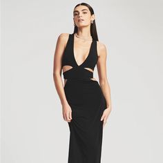 New With Tags Cutout V-neck Evening Dress, Black Maxi Dress With Cutout For Party, Black Cutout Maxi Dress For Party, Sleeveless Gala Dress With Cutout Details, Formal Black Maxi Dress With Cutout, Black Dress With Flattering Silhouette For Gala, Black Dresses With Flattering Silhouette For Gala, Black V-neck Maxi Dress With Cutout, Black Cutout V-neck Maxi Dress