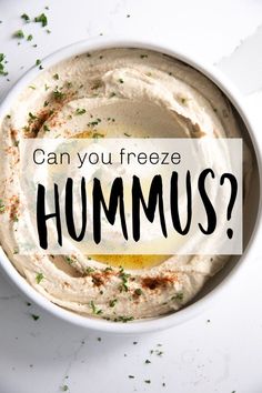 hummus in a bowl with the words can you freeze hummus?