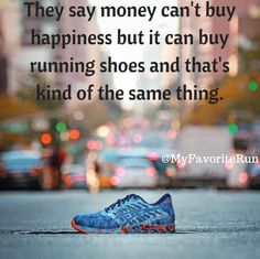 a blue shoe sitting on the side of a road next to a street sign that says, they say money can't buy happiness but it can buy running shoes and that's kind of the same thing