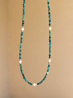 This delicate dainty necklace is made of natural chrysocolla - stone that has ability to bring harmony, calmness and empowerment. Little pearl accents make it more eye-catching and cute. Very easy to mix and match with other jewelry and wear practically with any outfit.  MATERIAL Chrysocolla,  freshwater pearls, gold filled.  SPECIFICATIONS Length 43 cm (17 inches) Beads are 3 mm Spring ring clasp Handmade in Spain Necklace comes in a gift box Worldwide shipment with registered, trackable post C Necklaces Minimalist, Necklaces Gift, Blue Beaded Necklace, Gemstone Necklaces, Silver Bead Necklace, Hippie Necklace, Aquamarine Jewelry, Necklace Beaded, Pearl Charms