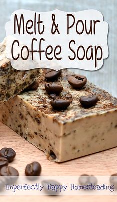 melt and pour coffee soap on a wooden surface with coffee beans around the soap bar