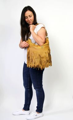 LEATHER FRINGE - leather boho fringe handbag. This hobo is the perfect size to carry your daily essentials in style! It is made from high quality leather. This leather bag can be used as a tote and messenger bag. By using the adjustable leather strap you can convert it into a crossbody bag. This leather bag is a perfect everyday bag! There is a lot of space and you can put there everything in your everyday life. * Lining * An external pocket on the back * Includes internal pockets for mobile pho Travel Fringe Hobo Shoulder Bag, Travel Hobo Shoulder Bag With Fringe, Fringe Hobo Shoulder Bag For Everyday Use, Everyday Fringe Hobo Shoulder Bag, Everyday Bohemian Shoulder Bag With Tassels, Everyday Fringe Rectangular Hobo Bag, Hobo Bags With Tassels For Everyday Use, Hobo Bag With Tassels For Everyday Use, Everyday Tassel Hobo Tote Bag