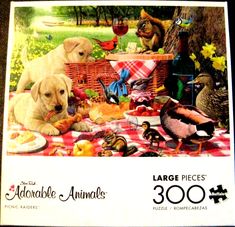 a puzzle box with dogs and ducks on the table in front of it is an image of a picnic