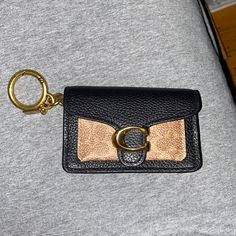 A Little Wallet To Hold Money Or Credit Cards That Can Be Attached To A Keychain Or Held In A Purse! Gold Rectangular Coach Coin Purse, Coach Rectangular Card Holder With Coin Pocket, Rectangular Coach Coin Purse For Gift, Coach Wallets With Rfid Blocking As Gift, Coach Rectangular Wallet On Chain, Coach Gold Wallet For Everyday Use, Coach Gold Wallet For Daily Use, Coach Gold Wallets For Everyday Use, Coach Gold Wallets For Daily Use