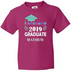 "How to Personalize: During checkout please enter the personalization text in the \"Notes to buyer\" section. Please do not include any other instructions other than your personalized text. This funny Kindergarten Graduate 2019 T-shirt features an adorable kindergarten graduate and is perfect for your little one's special Kindergarten completion day. 100% cotton preshrunk jersey knit Seamless 3/4\" collar Taped neck and shoulders Quarter-turned to eliminate center crease Double-needle sleeve and Customizable Crew Neck T-shirt For School Events, End Of School Year Custom Print Crew Neck T-shirt, Customizable Short Sleeve T-shirt For School Events, Crew Neck T-shirt With Name Print For School Events, Customizable Graduation T-shirt With Crew Neck, Customizable Crew Neck T-shirt For Graduation, Graduation Custom Print Short Sleeve T-shirt, Graduation Graphic Print Short Sleeve T-shirt, Short Sleeve T-shirt With Letter Print For School Events