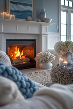 a living room filled with furniture and a fire place