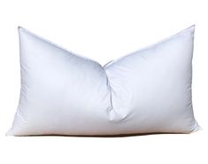 a white pillow on a white background