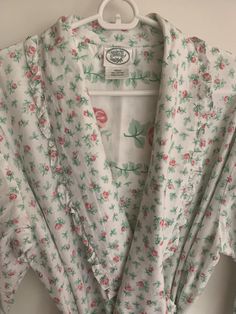 Beautiful cotton floral vintage Laura Ashley Robe. Tagged size medium.  Cotton Candy pink and green rosebu print Belted with large loop on back to keep it in place Two front patch pockets No issues!  Appears unworn Sold as is No returns Final Sale🌹🌹 Vintage Pink Robe For Spring, Spring Cotton Robe With Floral Print, Vintage Spring Robe For Home, Cotton Floral Print Robe For Daywear, Pink Vintage Floral Print Sleepwear, Pink Cotton Robe For Daywear, Vintage Spring Loungewear Robe, Spring Vintage Loungewear Robe, Spring Vintage Robe For Loungewear