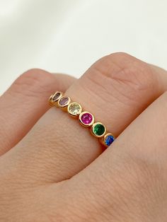 Rainbow Gemstone Eternity Band*Adjustable Multi Gemstone Stackable Ring*Gold Plated Rainbow Wedding Ring*Minimalist Colorful Eternity Band Materials :Rhodium Plated & Gold Plated ,Zircon Stone Our rhodium-plated jewelry: -After steel, rhodium-plated jewelry is the highest quality jewelry resistant to tarnish. -It is highly resistant to tarnish due to the quality of its coating. -They can rarely be affected by chemical contact and highly acidic sweat, so avoid contact. -Suitable for daily use, an Adjustable Infinity Stackable Rings For Anniversary, Adjustable Infinity Stackable Anniversary Rings, Adjustable Round Stone Birthstone Ring For Anniversary, Adjustable Open Ring With Halo Detail, Adjustable Birthstone Ring For Anniversary, Adjustable Round Birthstone Ring For Anniversary, Adjustable Fine Jewelry Birthstone Ring With Gemstone, Adjustable Gold Stackable Rings With Multi-stone, Adjustable Stackable Rings In Bezel Setting - Fine Jewelry