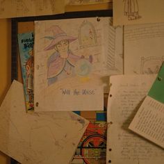 a bunch of drawings and papers on a wall with some writing in the middle that says will the wise be?