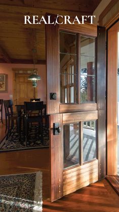 an open door leading to a deck and dining room