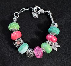 European style bracelet perfect for everyday. Pink and green beads give the bracelet a Spring and Easter theme. Bracelet Pandora, Green Bead, European Fashion, Easter Spring, Fashion Bracelets, Pink And Green, Jewelry Bracelets, Bracelet, Charm Bracelet