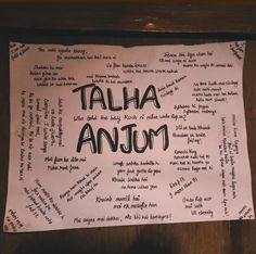 a piece of paper with the words talha anum written in black on it