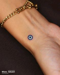 Evil Eye Tattoo Bracelet, Tattoo Ideas Female Evil Eye, Minimal Tattoo Travel, Magnet Tattoo Couples, Cute Evil Eye Tattoo, Evil Eye Tattoo On Wrist, Small Evil Eye Tattoos For Women, Evil Eye Ankle Tattoo, Evil Eye Minimalist Tattoo