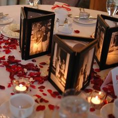 three pictures are placed on a table with rose petals and candles in front of them