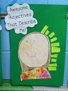 children's artwork on green paper with words above them