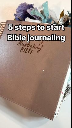 a brown bible with the words 5 steps to start bible journaling