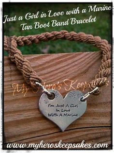 a bracelet with a heart on it and the words, just a girl in love with a marine tan boot band bracelet