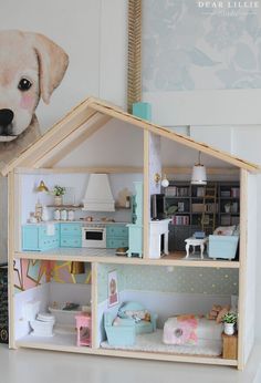 a doll house with a dog on the wall