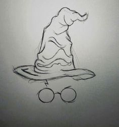 a drawing of a wizard's hat on top of a skateboard with glasses