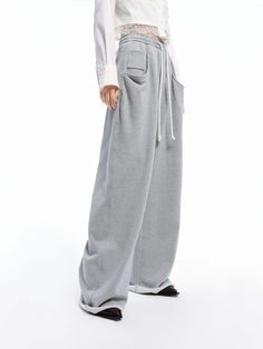 MO&Co. Women's Drawstring Wide Leg Pants Get ready to experience ultimate comfort with our pants! Made from pure cotton, these pants are soft and cozy to wear. With a drawstring waistband and side pockets, you can move freely and carry your essentials easily. Embrace a relaxed yet stylish look with our wide-leg design. Features : - High waist, wide leg- Elastic waistband with drawstring- Side slanting pockets, raw hem Code: MBD1PATT09The back length of size M is 110cmMATERIALS & CARE Material: 1 Everyday Wide Leg Pants With Drawstring, Everyday Wide Leg Drawstring Pants, Cotton Wide-leg Pants With Ribbed Waistband, Cotton Wide Leg Pants With Side Pockets For Loungewear, Relaxed Fit Parachute Pants With Pockets For Loungewear, Relaxed Baggy Pants With Drawstring, Cotton Wide Leg Pants With Drawstring For Fall, Relaxed Baggy Drawstring Pants, Everyday Wide-leg Pants With Drawstring