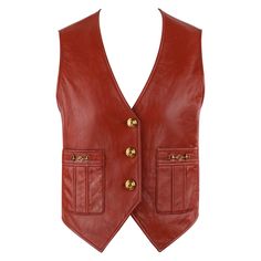 Brand / Manufacturer: Gucci Collection: Pre-fall 2019 Designer: Alessandro Michele Style: Waistcoat Vest Color(s): Shades of brown, gold Lined: Yes Marked Fabric Content: "100% leather" (exterior), "100% cupro" (lining) Unmarked Fabric Content (feel of): metal (hardware) Additional Details / Inclusions: Gucci pre-fall 2019 leather waistcoat vest. Structured fabric; little to no stretch or give to material. Deep v-neck neckline, form-fitting cut to vest. Three-button closure to center front of ve Alessandro Michele Style, Gucci Collection, Sleeveless Waistcoat, Structured Fabric, Leather Waistcoat, Gucci Jacket, Alessandro Michele, Shades Of Brown, Gold Buttons