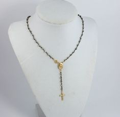 "This is the stunning 14kt gold filled rosary inspired necklace. This is an 18\" necklace made of 2-3mm faceted Pyrite Gemstones on 24kt Gold Vermeil. The clasp closure connects at the center Miraculous Medallion. Necklace drop measures 2 1/2\" and includes a 14kt Gold filled cross that measures 3/4\". You may order this necklace with the clasp closure in back by leaving a note at checkout. Comes nicely boxed for the perfect gift! This necklace may be ordered in all Pyrite on Gold chain, see las Crucifix Jewelry With Faceted Beads As Gift, Crucifix Jewelry With Faceted Beads For Gift, Crucifix Shaped Jewelry With Faceted Beads As Gift, Spiritual Crucifix Jewelry With Faceted Beads, Rosary Inspired Necklace, Gold Rosary Necklace, Rosary Gift, Cross Necklace Women, Anniversary Ring Set