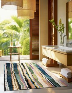 a bathroom with a large rug on the floor