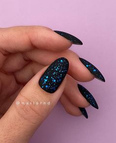 Galaxy Almond Nails, Black Nails Blue Glitter, Vampy Nails Short, Black Nails With Blue Glitter, Navy Nails With Glitter, Crystal Cat Eye Nails, Space Theme Nails, Black Dip Nails Ideas, Sparkly Nails Ideas