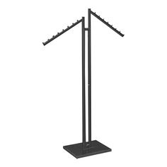 a black metal pole with three lights on top and two poles in the middle,