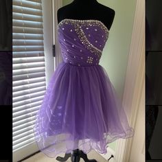 Purple Organza Embellished Party Dress With Lace Up Back (Lace Included). Worn Once And In Brand New Condition. Open To Offers! Embellished Purple Mini Dress For Prom, Purple Embellished Strapless Dress, Purple Embellished Evening Dress For Homecoming, Purple Party Dresses With Rhinestones, Embellished Purple Dresses For Cocktail, Embellished Purple Cocktail Dress, Purple Rhinestone Party Dress, Purple Embellished Cocktail Evening Dress, Embellished Party Dress