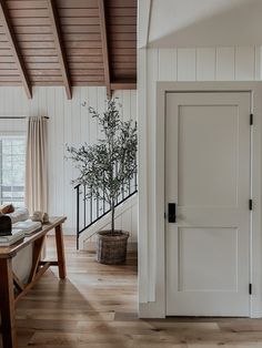 a white door with the words contrast trim on it in front of a wooden floor