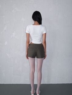 **ALL PREORDER ITEMS WILL BE SHIPPED WITHIN 2 WEEKS AFTER ORDER PLACED** Micro Low-Waist Shorts have a minimal look that pairs seamlessly with any style. Style them with our Jennie tights for a versatile and chic outfit. Button and zipper closure Both side pockets Thick material Soft wooly texture Polyester 55%, Acrylic 45% Made In Korea Fitted White Pants With Short Inseam, Mid-rise Fitted Bottoms With Built-in Shorts, Fitted Mid-rise Bottoms With Built-in Shorts, Casual High Waist Bottoms With Minimal Stretch, Fitted Pants With Short Inseam For Work, Fitted Workwear Bottoms With Short Inseam, Casual White Bottoms With Minimal Stretch, Minimal Look, Chic Outfit