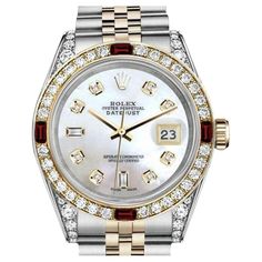 Ladies Rolex 26mm Datejust Two Tone Jubilee White MOP Mother Of Pearl 8 + 2 Diamond Accent Bezel + Lugs + Rubies 69173. This watch is in like new condition. It has been polished, serviced, and has no visible scratches or blemishes. All our watches come with a standard 1-year mechanical warranty and a LIFETIME diamond replacement warranty. We are so confident in our diamond setters that if any of the individual diamonds are ever to fall out of our watches, we will replace them free of charge for Rolex 26mm, Emerald Watch, Rolex Diamond, Rolex Women, Gold Rolex, Diamond Face, Rolex Men, Vintage Rolex, Rolex Oyster Perpetual