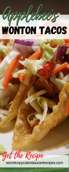 an appetizer plate with wonton tacos and coleslaw on it