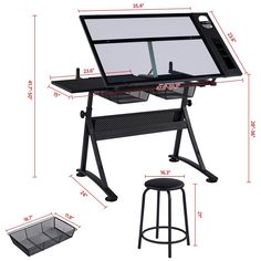 a computer desk with a keyboard and stool