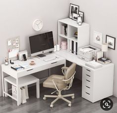 an office desk with a computer and chair