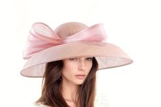 Hats By Cressida Wedding, Kentucky Derby & Ascot Hats Dusty Blush Pink Saskia Large Formal Ascot Hat for Kentucky Derby Church Weddings Classic Audrey Hepburn Dusty Blush Pink Dome Down Turned wide brimmed sinamay hat trimmed with dusky pink abacca silk trim The brim on the Saskia formal hat measures 41 cm side to side with a crown height of 11cm The Saskia hat has an inside circumference is 58cm.  This wide brim hat is perfect for any formal occasion such as a wedding, bridal shower, tea party or ladies luncheon.  This womans special occasion hat also is great for a day at the races like the Kentucky Derby, Ladies Day, Royal Ascot, Cheltenham, Goodwood, Dubai Cup, Breeders Bup and Spring Racing Festival.  We make each hat to order just for you, we would prefer if you did not order for cho Elegant Summer Fascinator For Ceremony, Elegant Summer Ceremony Fascinator, Spring Ceremony Fitted Hats, Fitted Mini Hats For Summer Weddings, Elegant Summer Wedding Mini Hat, Feminine Hats For Wedding And Royal Ascot, Pink Summer Fascinator For Ceremony, Elegant Summer Wedding Hat, Feminine Mini Hats For Weddings