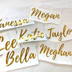 four pieces of paper with gold foil on them that say, meagan, kate taylor, eee bella megaha