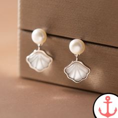 Sea Shell Earrings Silver Ocean-inspired Earrings For Gifts, Ocean-inspired Single Earring As Gift, Silver Ocean-inspired Earrings, Shell-shaped Clip-on Earrings For Gift, Elegant Shell-shaped Clip-on Earrings As Gift, Elegant Shell-shaped Clip-on Earrings For Gift, Silver Shell-shaped Pearl Earrings For Gifts, Elegant Shell-shaped Earrings For Gift, White Gold Mother Of Pearl Earrings For Gift