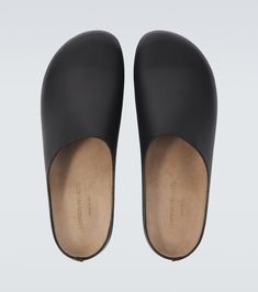 Find COMMON PROJECTS Leather Clogs on Editorialist. Upper: leather. Lining: leather. Sole: rubber insole and sole. Toe shape: round toe. Made in Italy. Includes: shoe box, dust bags. Designer color name: Black. Leather Clogs With Leather Footbed And Flat Heel, Leather Mules With Rubber Sole And Closed Toe, Leather Closed Toe Mules With Rubber Sole, Slip-on Clogs With Rubber Sole And Plain Toe, Modern Slip-on Clogs With Rubber Sole, Black Clogs With Leather Footbed For Work, Leather Sole Slip-on Clogs With Plain Toe, Leather Sandals With Rubber Sole For Work, Leather Slip-on Clogs With Leather Footbed