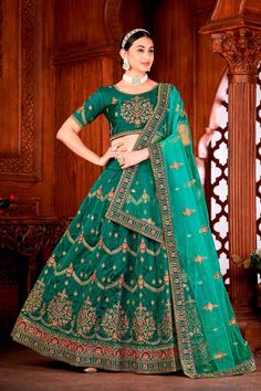 color-green, fabric-silk, work-embroidered, brand-name-krupali-savani,occasion-festivewear, occasion-wedding-guest, womenswear,ideal-for-women, lehengas, Product Features: Color: Green Lehenga Fabric: Taffeta Silk Choli Fabric: Taffeta Silk Work: Embroidered Work Sleeves: Elbow Sleeves Neck Type: Round Neck Wash Care: Dry Clean Occasion: Festivewear, Wedding Guest Product Type: Lehenga Choli with Dupatta Disclaimer: There will be slight difference in digital to actual image Semi-stitched Green Embroidered Fabric, Green Embroidered Raw Silk Lehenga, Embroidered Green Raw Silk Lehenga, Green Raw Silk Choli With Intricate Embroidery, Green Chanderi Choli With Intricate Embroidery, Green Art Silk Choli With Intricate Embroidery, Green Anarkali Lehenga With Resham Embroidery, Anarkali Style Green Lehenga With Resham Embroidery, Green Lehenga With Intricate Embroidery For Festive Occasions