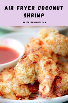 air fryer coconut shrimp on a plate with dipping sauce